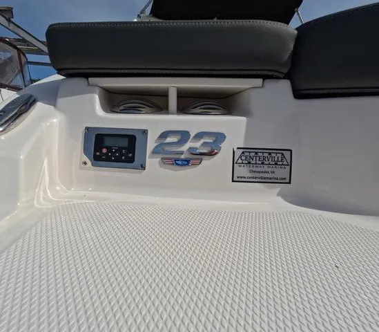 Slide: The Image of 2022 Chaparral 23 SSi OB boat, white deck, Centerville Marina label, excellent condition. - 7