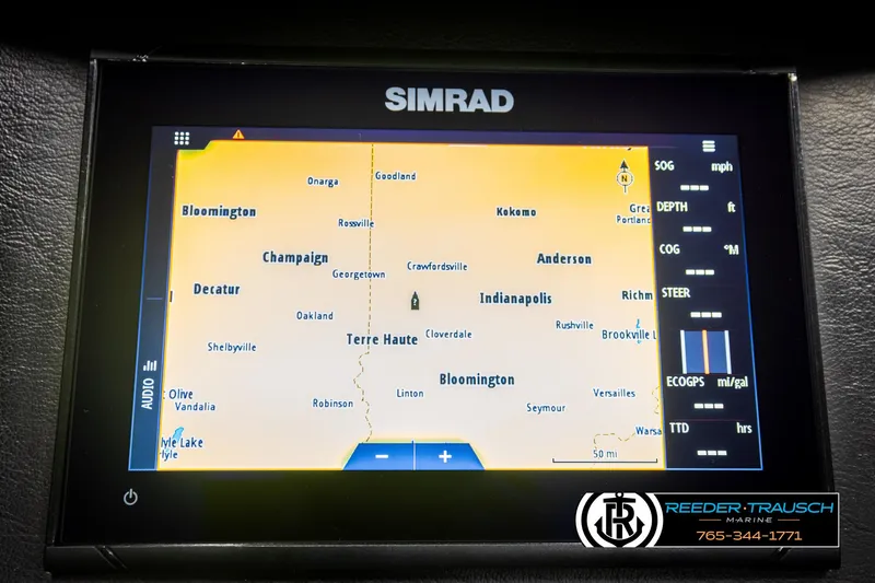 Slide: The Image of Simrad navigation display on 2022 Premier 230 Solaris RL boat, showing map and controls. - 35