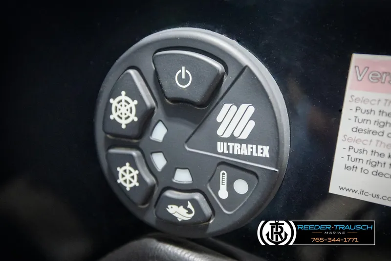 Slide: The Image of Control panel of 2022 Premier 230 Solaris RL boat with Ultraflex branding. - 38