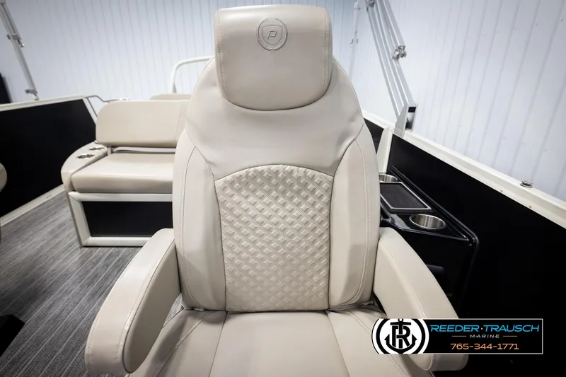 Slide: The Image of Captain's chair in 2022 Premier 230 Solaris RL pontoon boat interior. - 40