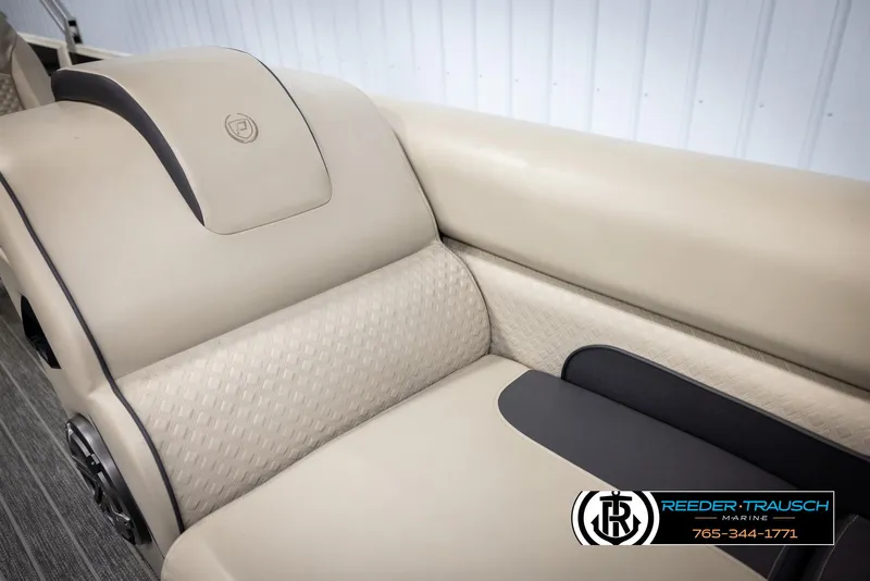 Slide: The Image of Luxurious seating in 2022 Premier 230 Solaris RL boat, featuring beige upholstery and sleek design. - 42