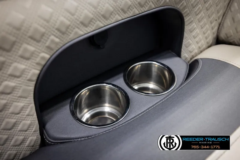 Slide: The Image of 2022 Premier 230 Solaris RL cup holders with textured upholstery detail. - 44