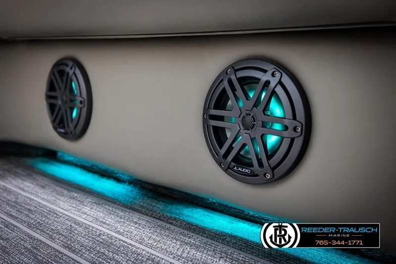 Slide: The Image of 2022 Premier 230 Solaris RL boat speakers with blue LED lighting. - 46