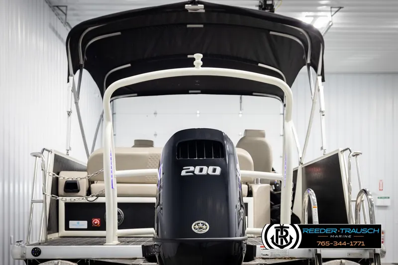 Slide: The Image of 2022 Premier 230 Solaris RL pontoon boat with 200 HP engine, rear view. - 7