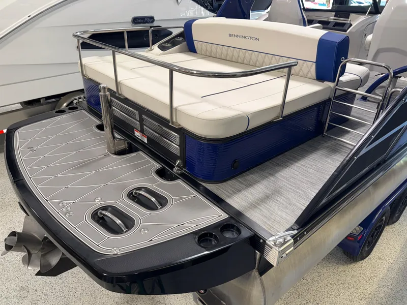 Slide: The Image of 2021 Bennington QX25 pontoon boat with sleek seating and modern design. - 29