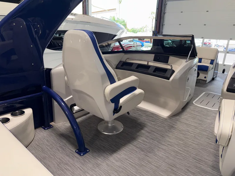 Slide: The Image of 2021 Bennington QX25 boat interior with modern helm and seating. - 37
