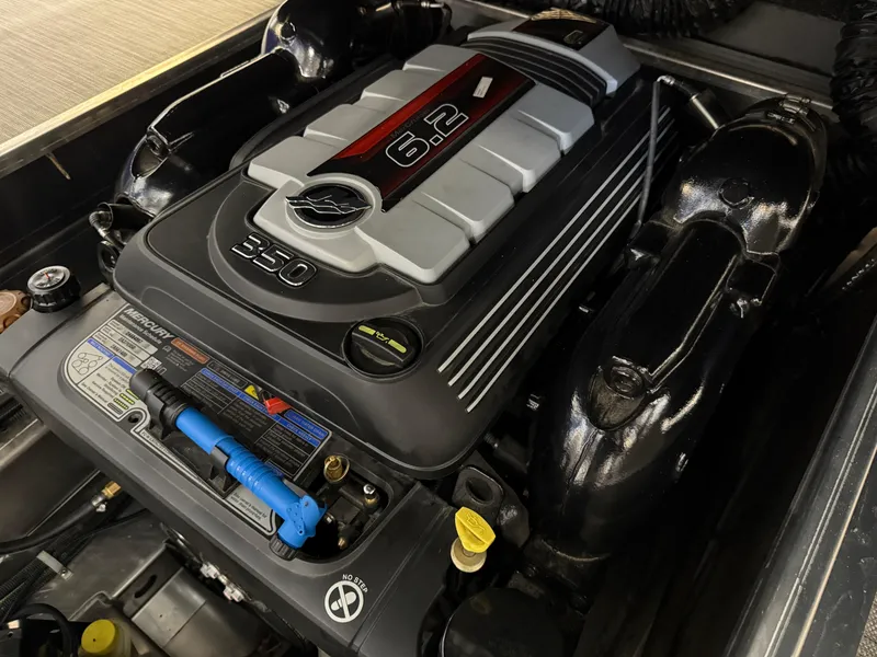 Slide: The Image of 2021 Bennington QX25 engine, 6.2L V8, detailed view of powerful marine motor. - 45