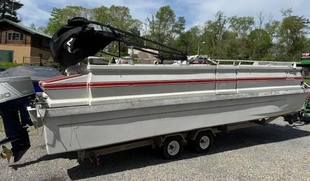 Slide: The Image of 1988 Skipper Craft 240 boat on trailer, parked outdoors. - 4
