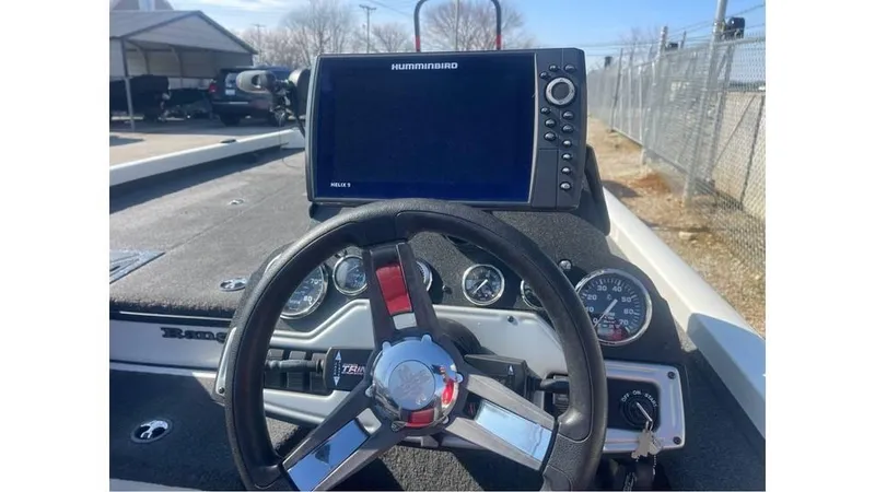 Slide: The Image of 2018 Ranger RT198P boat dashboard with steering wheel and Humminbird fish finder. - 10