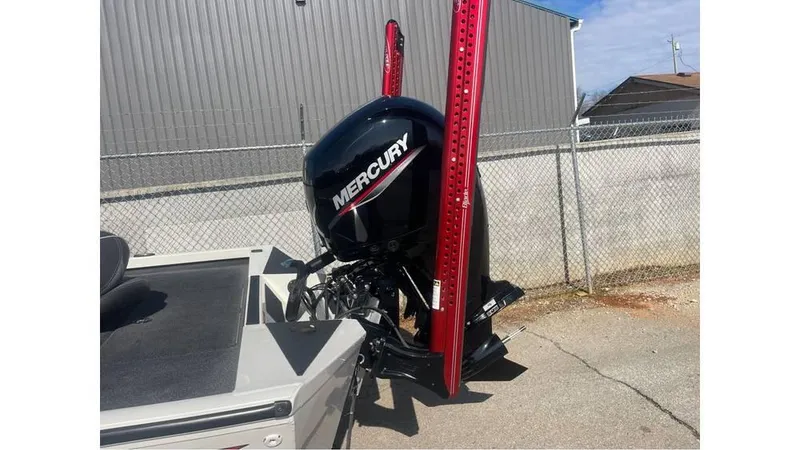 Slide: The Image of 2018 Ranger RT198P boat with Mercury outboard motor and red power poles. - 7