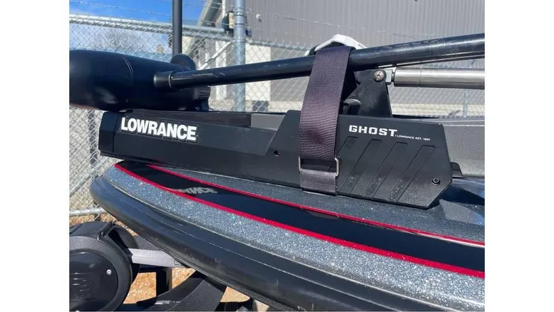 Slide: The Image of 2020 Nitro Z21 boat with Lowrance Ghost trolling motor, secured with a strap. - 7