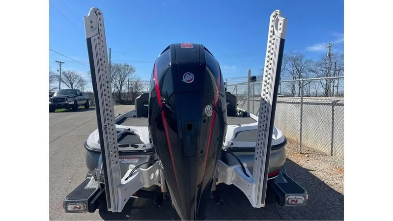 Slide: The Image of 2020 Nitro Z21 boat rear view with powerful outboard motor and dual power poles. - 8