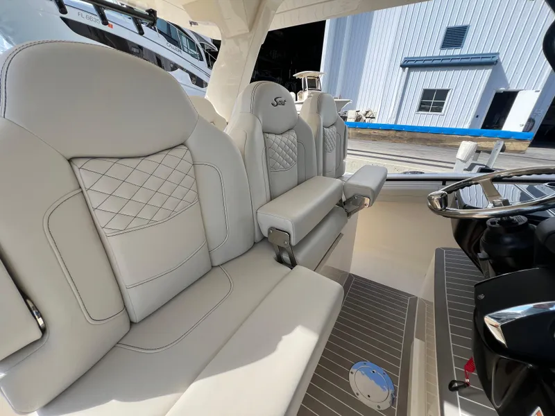 Slide: The Image of Luxurious seating on 2025 Scout 425 LXF boat, featuring elegant design and premium materials. - 23