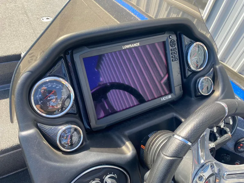 Slide: The Image of Dashboard of 2019 Triton 20 TRX Patriot boat with Lowrance HDS display. - 11