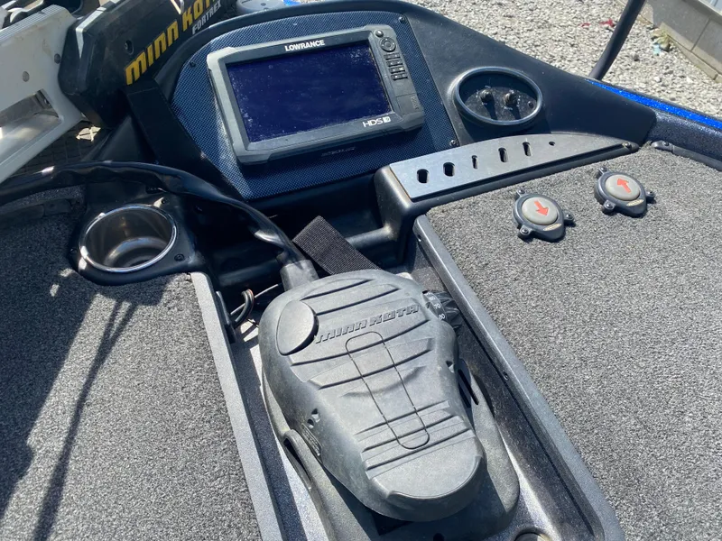 Slide: The Image of 2019 Triton 20 TRX Patriot boat dashboard with Lowrance fishfinder and Minn Kota trolling motor controls. - 14