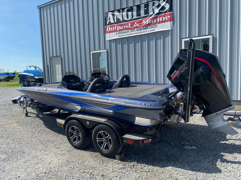 Slide: The Image of 2019 Triton 20 TRX Patriot boat parked outside Angler's Outpost & Marine. - 25