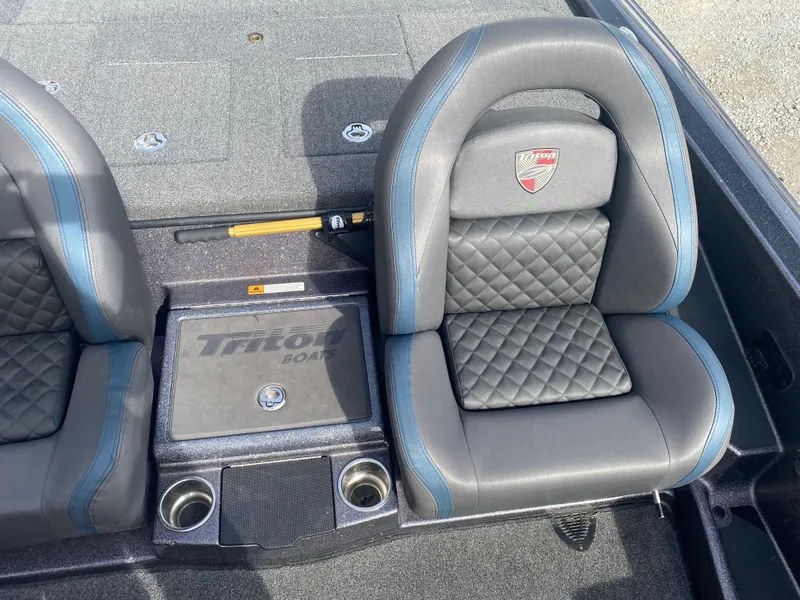 Slide: The Image of 2020 Triton 21 TrX boat seats with quilted design and cup holders. - 22