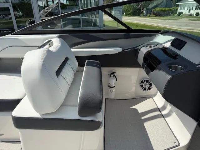 Slide: The Image of 2025 Regal LS2 boat interior with modern seating and dashboard design. - 10