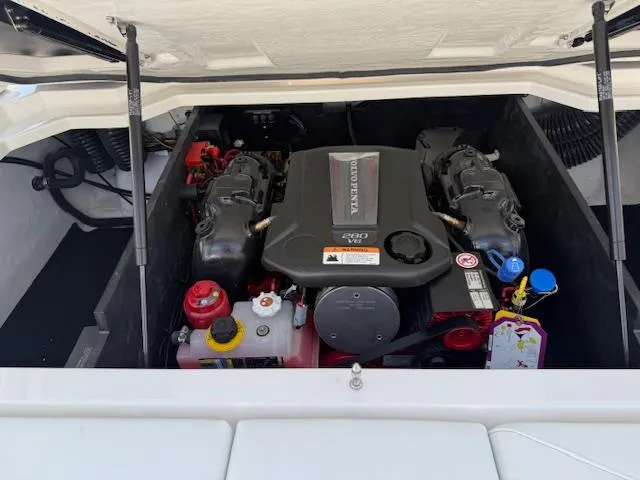 Slide: The Image of Engine compartment of a 2025 Regal LS2 boat, featuring a powerful motor setup. - 22