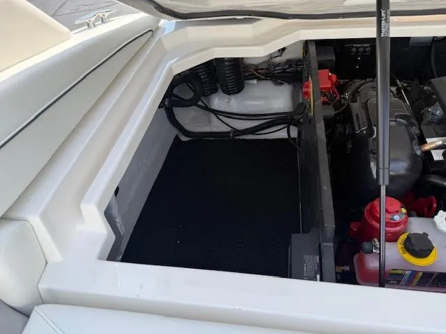 Slide: The Image of Engine compartment of a 2025 Regal LS2 boat, showcasing clean design and components. - 24