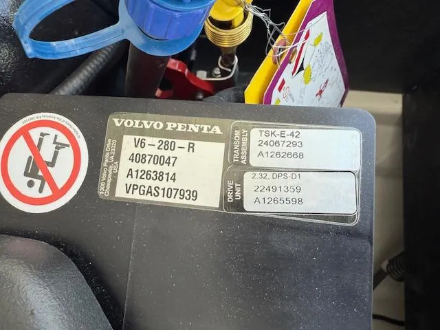 Slide: The Image of Volvo Penta engine label with specifications and warning sticker, Regal LS2 2025 model. - 25