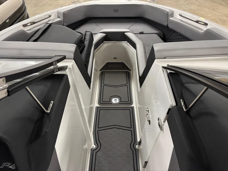 Slide: The Image of 2023 Cobalt R4 Surf boat interior with sleek seating and modern design. - 11