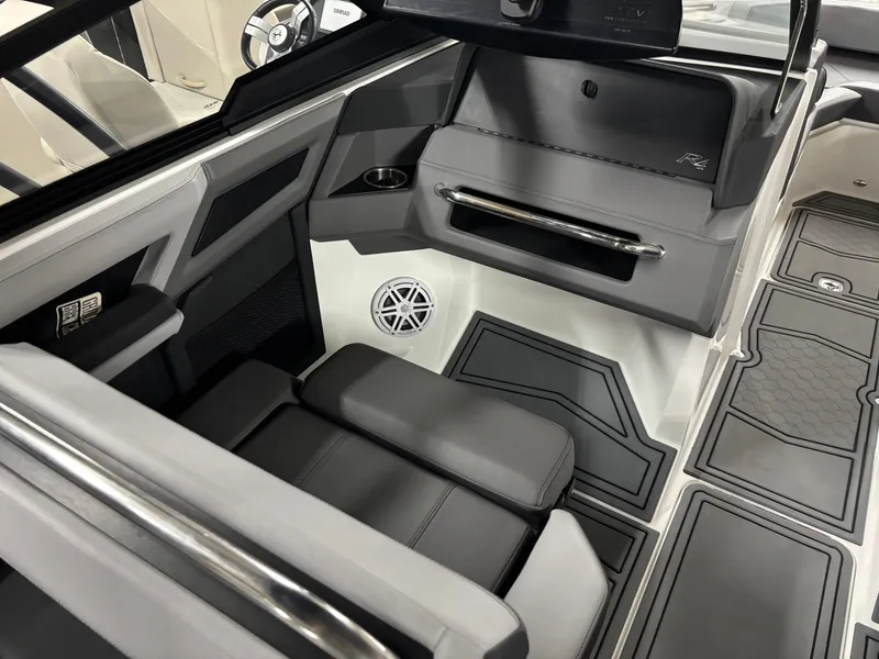 Slide: The Image of 2023 Cobalt R4 Surf boat interior with sleek seating and modern design elements. - 15