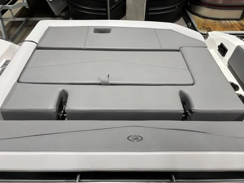 Slide: The Image of 2023 Cobalt R4 Surf boat with sleek gray seating and modern design. - 18