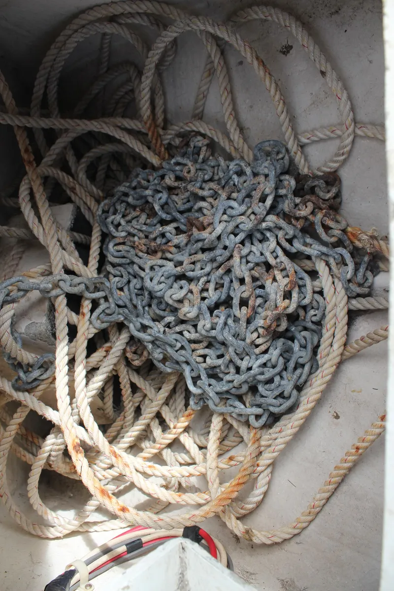 Slide: The Image of Rope and chain in a 1985 Trojan 10m Fly boat compartment. - 5