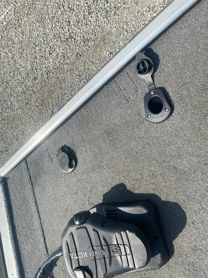 Slide: The Image of 2019 Bass Tracker Classic boat deck with motor pedal and fittings. - 12