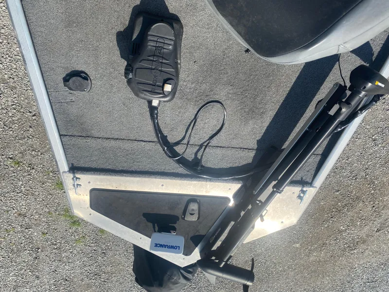 Slide: The Image of 2019 Bass Tracker Classic boat deck with trolling motor and Lowrance fish finder. - 13