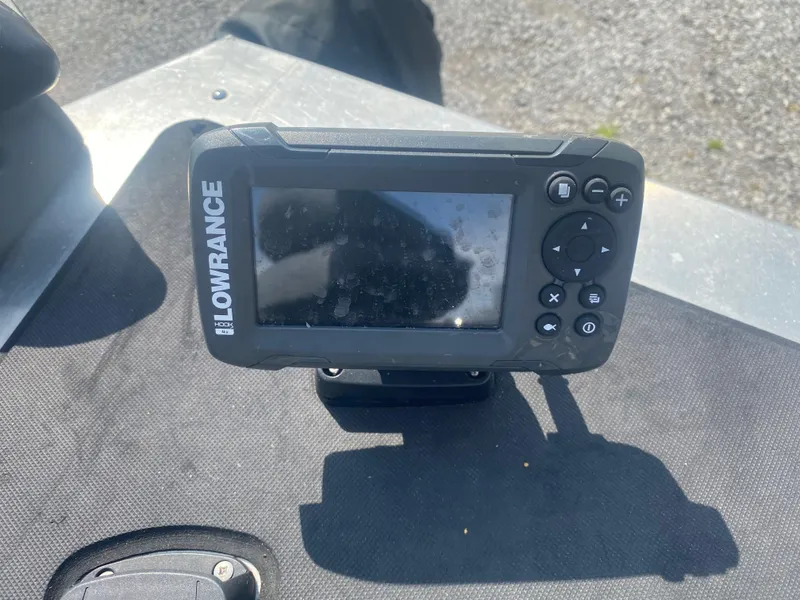 Slide: The Image of Lowrance fish finder on 2019 Bass Tracker Classic boat dashboard. - 14