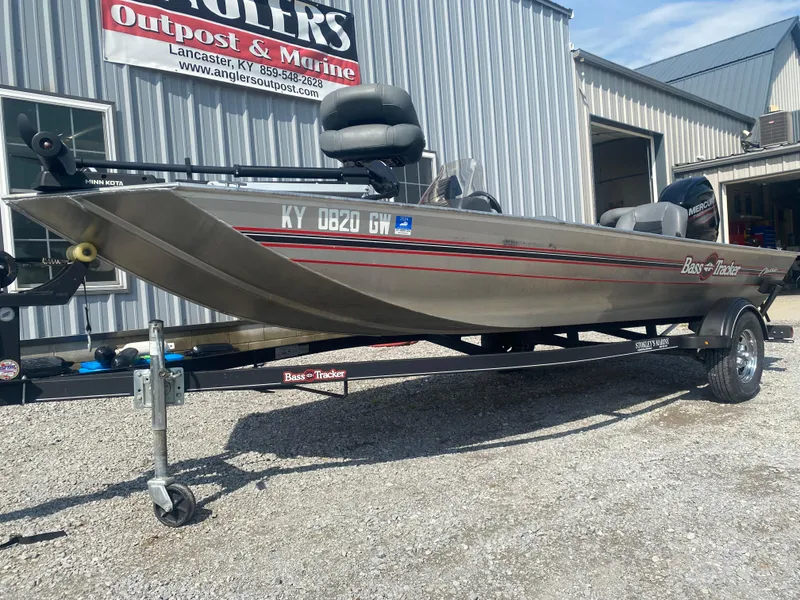 Slide: The Image of 2019 Bass Tracker Classic boat on trailer outside Angler's Outpost & Marine. - 3