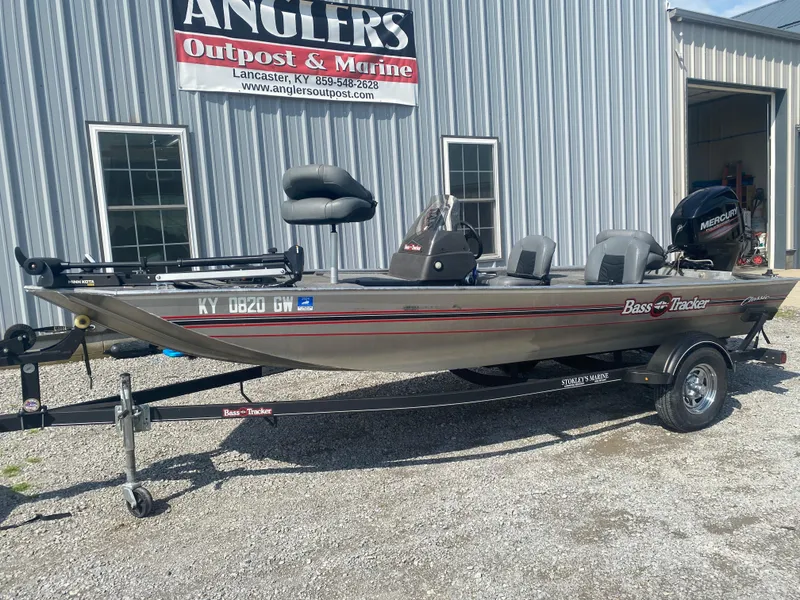 Slide: The Image of 2019 Bass Tracker Classic boat on trailer outside Angler's Outpost & Marine. - 6