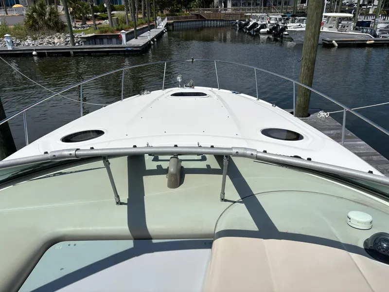 Slide: The Image of 2003 Sea Ray 340 Sundancer yacht docked at marina, view from bow. - 7