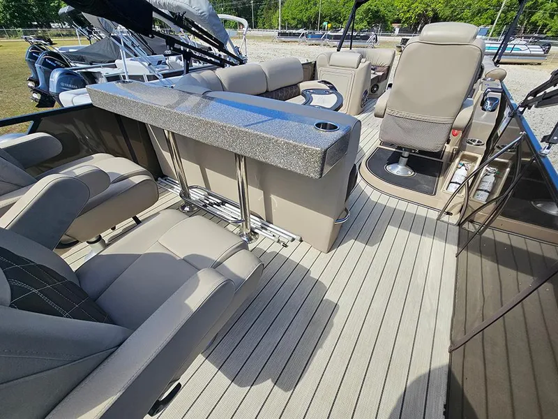 Slide: The Image of Luxurious interior of 2024 SunCatcher Elite 326 SE pontoon boat with plush seating and sleek design. - 12