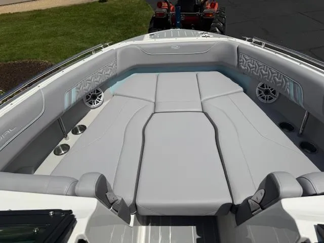 Slide: The Image of 2025 Regal LS6 Surf boat interior with sleek gray seating and modern design. - 19