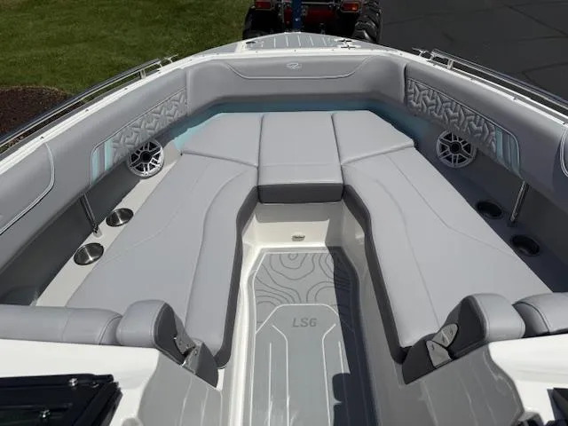 Slide: The Image of 2025 Regal LS6 Surf boat interior with luxurious gray seating and modern design. - 20