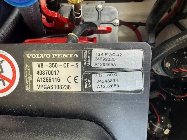 Slide: The Image of Volvo Penta engine label on 2025 Regal LS6 Surf boat, displaying model and serial numbers. - 35