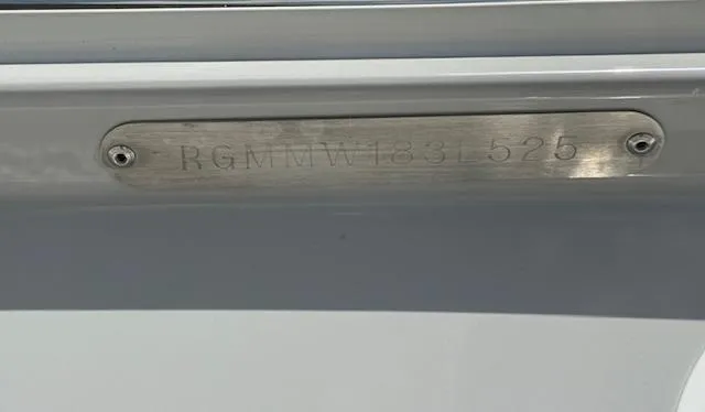 Slide: The Image of 2025 Regal LS6 Surf boat identification plate with serial number engraved. - 36