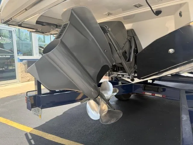 Slide: The Image of 2025 Regal LS6 Surf boat propeller and stern on a trailer. - 5