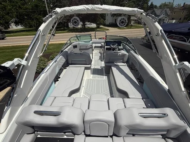 Slide: The Image of 2025 Regal LS6 Surf boat interior with spacious seating and modern design. - 8
