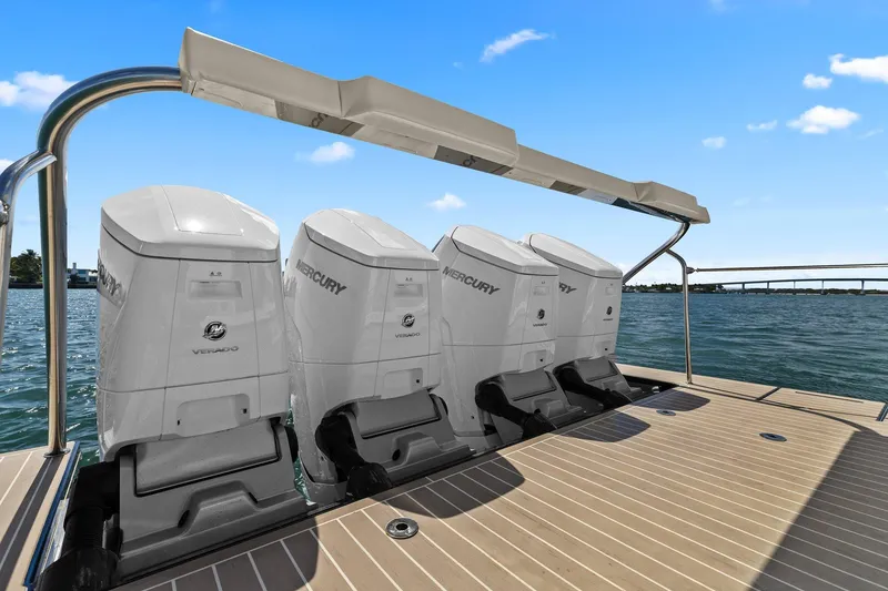 Slide: The Image of 2025 Formula 500 Super Sport Crossover with four Mercury outboard engines on a sunny day. - 5