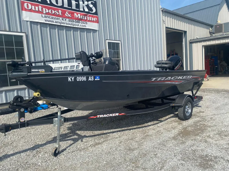 Slide: The Image of 2021 Tracker Pro Guide V-16 WT boat on trailer outside Angler's Outpost & Marine. - 3