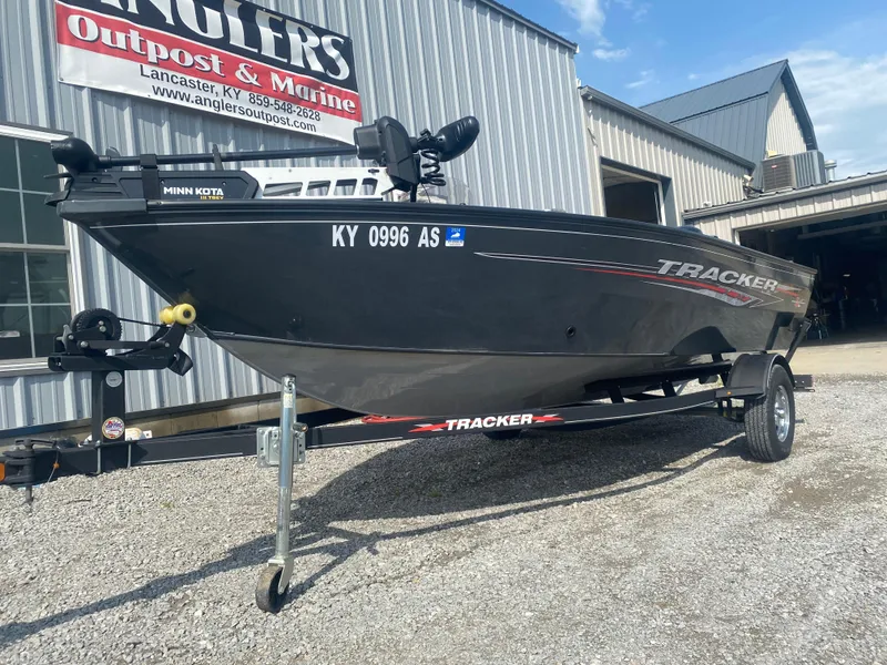 Slide: The Image of 2021 Tracker Pro Guide V-16 WT boat on trailer outside Angler's Outpost & Marine. - 4