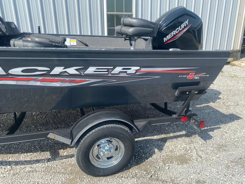Slide: The Image of 2021 Tracker Pro Guide V-16 WT boat with Mercury engine on a trailer. - 9