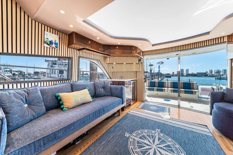 Slide: The Image of Luxurious interior of a 2007 Marquis 55 LS yacht with waterfront view. - 20