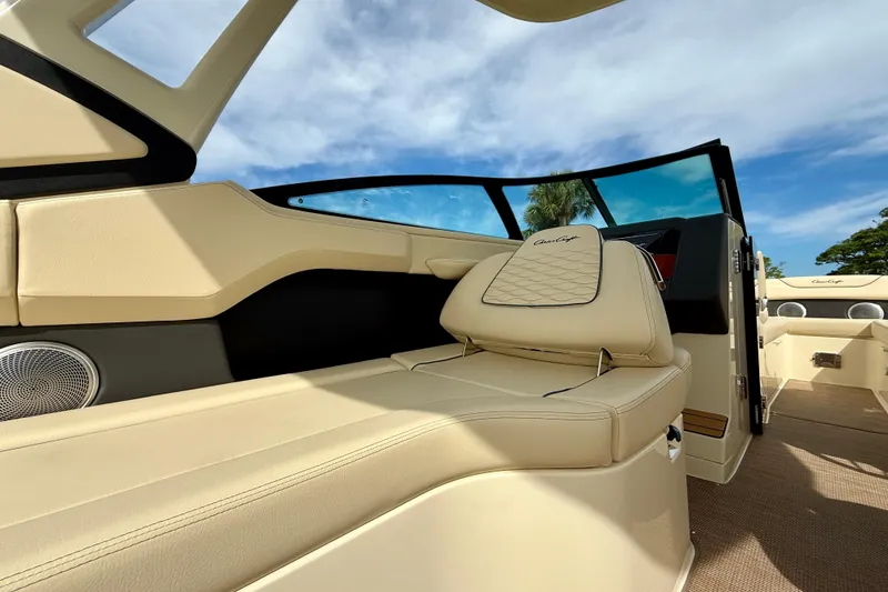 Slide: The Image of Luxurious interior of 2026 Chris-Craft Sportster 28 boat with beige seating and modern design. - 19
