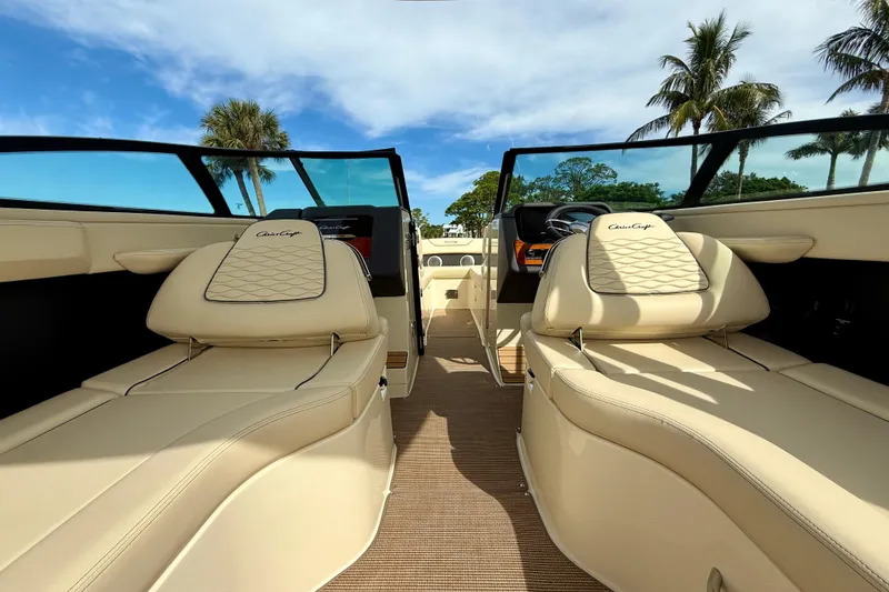 Slide: The Image of 2026 Chris-Craft Sportster 28 interior with luxurious beige seating and sleek design. - 20