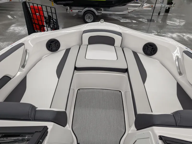 Slide: The Image of 2024 Yamaha AR195 boat interior with sleek seating and modern design. - 10